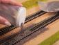 Preview: Noch 09367 H0,TT PROFI-Schotter “Gneis” rotbraun, 250 g
