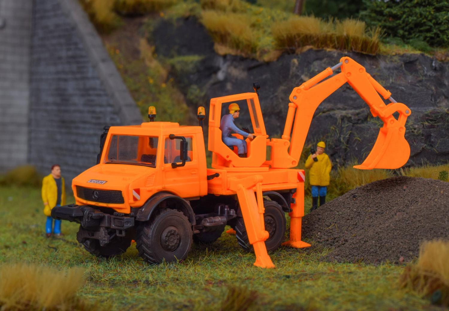 Kibri 18480 H0 UNIMOG mit Aufbaubagger